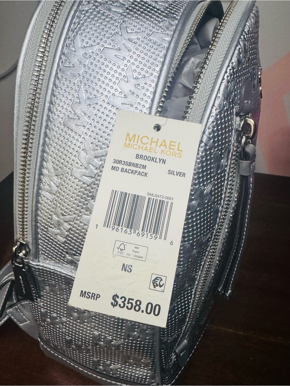 Michael Kors Metallic Silver MK Embossed Logo Backpack - Picture 7 of 9